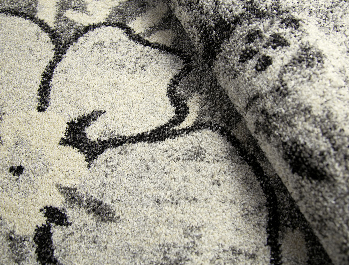 Un dettaglio del tappeto Art Flower Grey